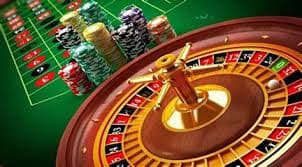 Tampilan desktop dukuntoto menampilkan studio live-dealer dengan meja blackjack dan roulette